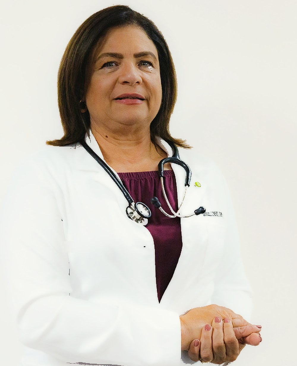 Studio portrait of Dr. Valdes in her white coat with stethoscope